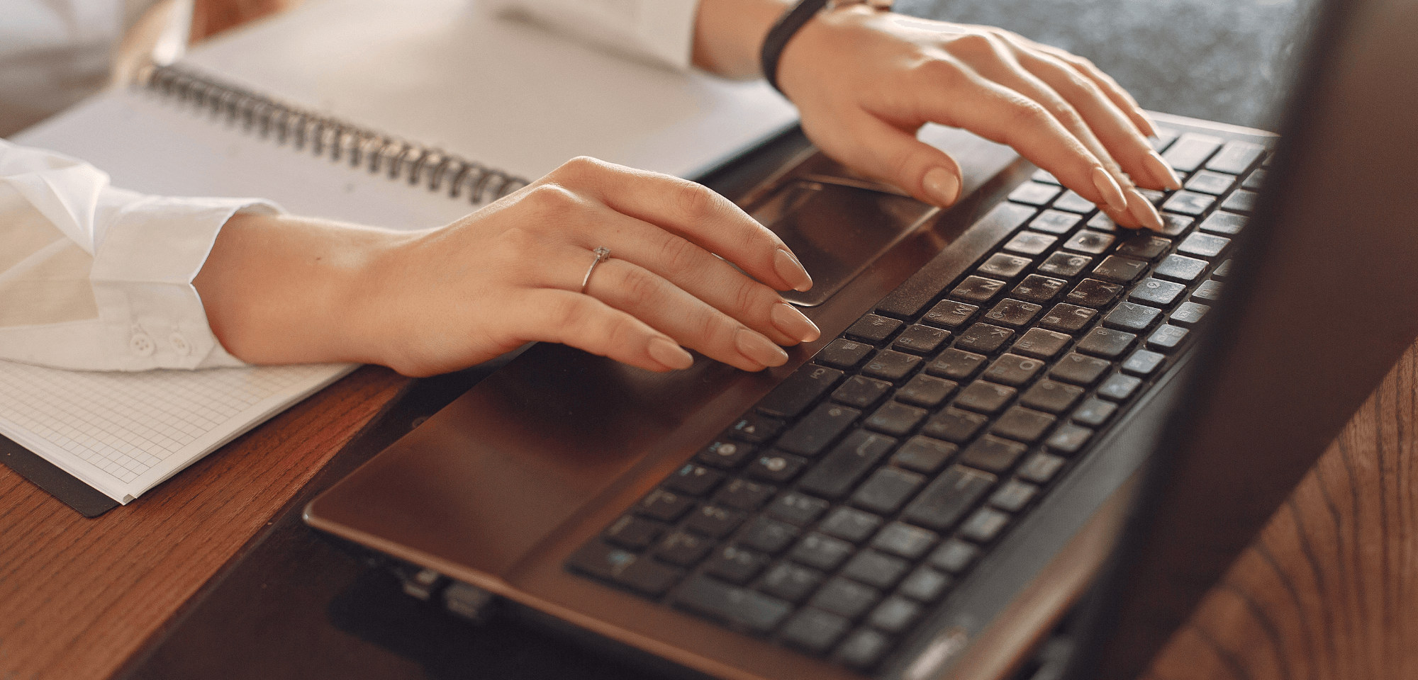 Woman writing blog posts about organisational transformation